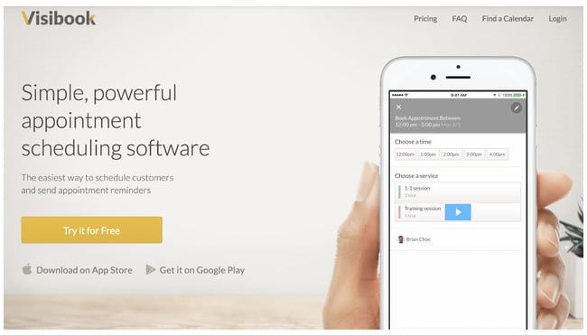 Visibook scheduling app homepage featuring a phone with the app displayed on screen