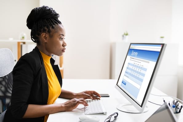 marketer creating a custom survey with free online survey software